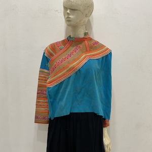 Vintage tribal Flower Hmong women tunic in Bac Ha area,in the north of Vietnam