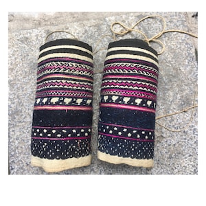 Vintage tribal red Dao hand embroidered leg warmers in CaoBang province in the north of Vietnam