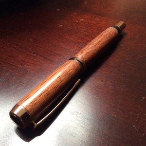 Baron rollerball in Bubinga wood with copper trim