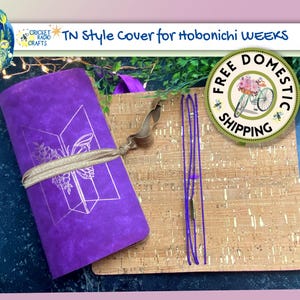 May include: Purple notebook cover with a butterfly design and cork board backing. The cover is made of a soft, textured material and has a gold ribbon tied around it. The cork board is a natural material with a light brown color. The text "FREE DOMESTIC SHIPPING" is visible in a green circle with a bicycle graphic.