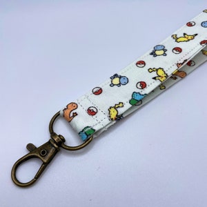 Pokémon Lanyard – Pikachu, Charmander, Squirtle, Bulbasaur Fabric, Anime Gamer Gift