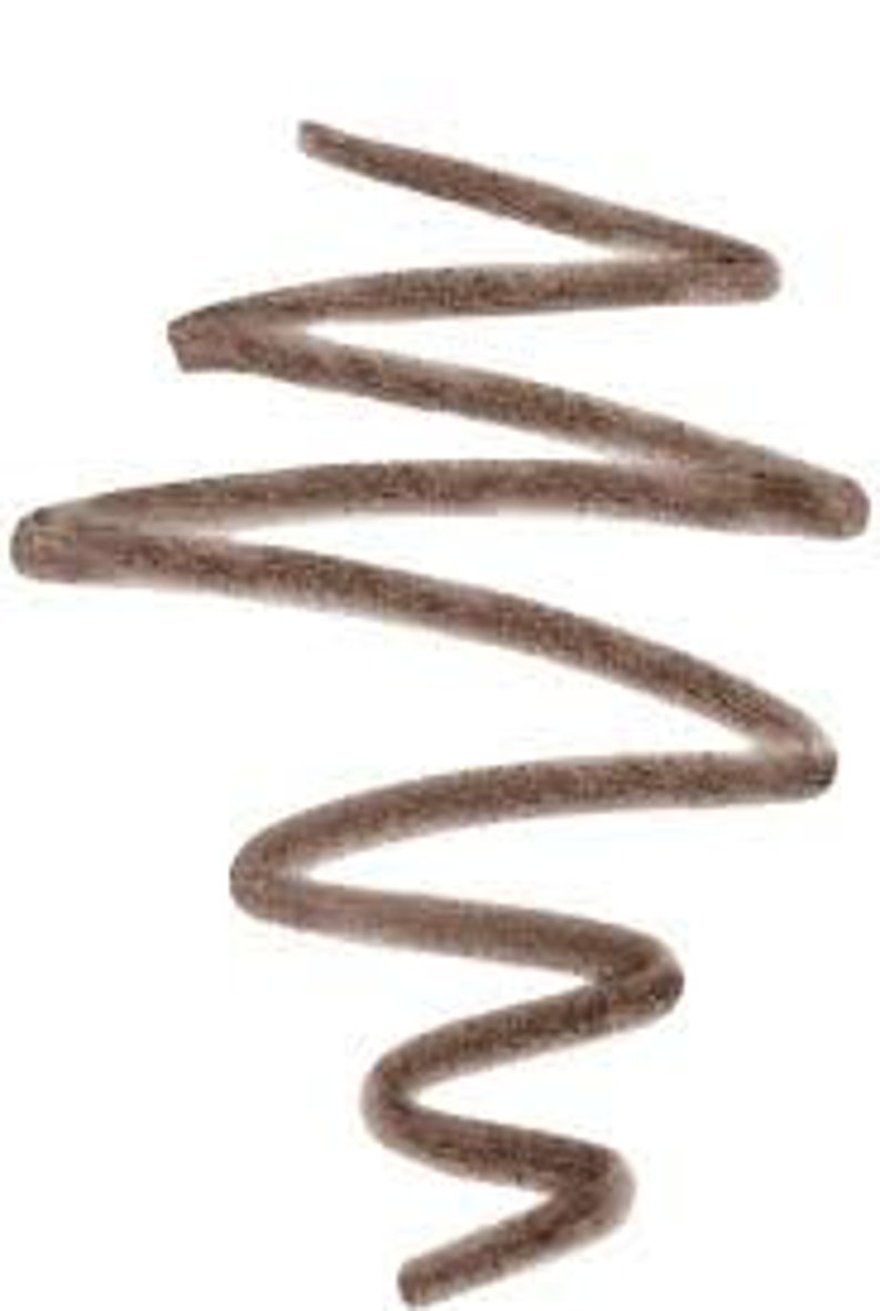 May include: A brown eyeliner pencil with a sharp point. The pencil is lying on a white surface and is slightly curved.