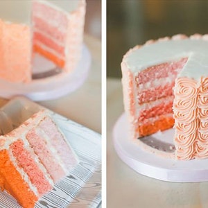 Peut inclure: Un g&acirc;teau &agrave; plusieurs &eacute;tages ombr&eacute; avec un gla&ccedil;age rose, orange et blanc. Le g&acirc;teau est d&eacute;cor&eacute; d'un gla&ccedil;age en spirale et est coup&eacute; en tranches.