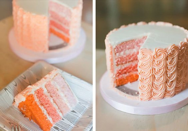 Peut inclure: Un g&acirc;teau &agrave; plusieurs &eacute;tages ombr&eacute; avec un gla&ccedil;age rose, orange et blanc. Le g&acirc;teau est d&eacute;cor&eacute; d'un gla&ccedil;age en spirale et est coup&eacute; en tranches.