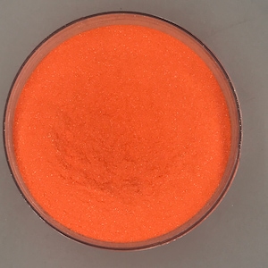 Peut inclure: Vue rapprochée d'un petit récipient rond rempli de paillettes orange vif.