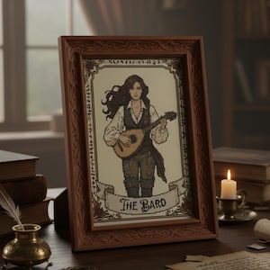 May include: A framed cross-stitch artwork featuring a figure playing a lute, labeled "The Bard." The frame is brown, and the artwork is set on a wooden desk with a quill, books, and a lit candle. The background includes a window and bookshelves.