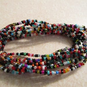 5 Dark Tribal seed bead stretch bracelets. Dark bright mix to wear several or all stacked. Mix with your others stacks. All gender mix #220