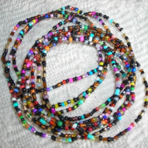 5 Dark Tribal Bead anklets on strong stretch cord. Matches the tribal bracelets. Wear both this summer for a great style setting look #