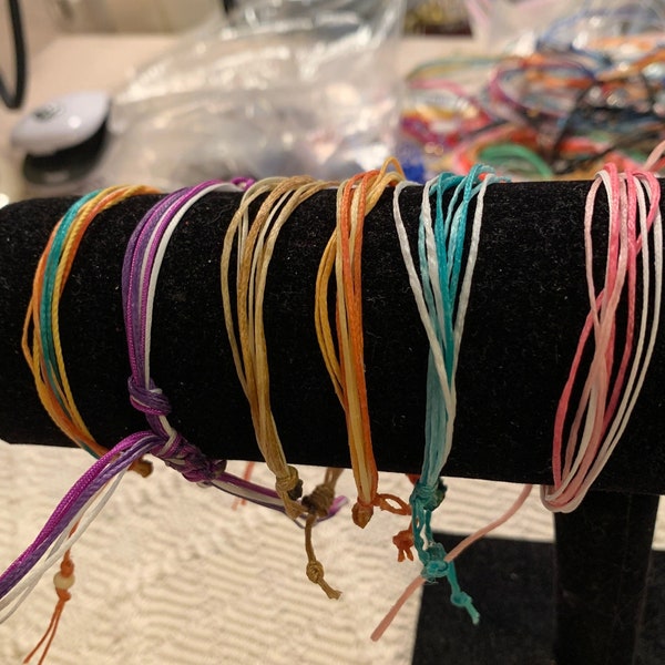 Friendship bracelets with mixed color waxed cord with a slide closure that fit a between 5-9” wrist or ankle. 2 for 5.00 SALE