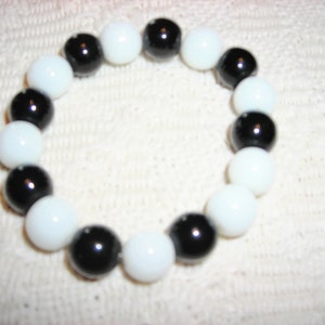 6MM black and white bead bracelet. Beautiful in its stark simplicity. I also offer an 8mm bead in this bracelet. Gift for her.