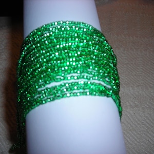 5 Silver lined tiny seed bead bracelets. Glorious colors, sparkle, shine and blind the eye with these beautiful colors. Too many to list.