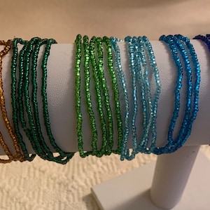 SALE!! Five (5) of the most sparkling, iridescent,glistening czech seed bead bracelets ever.These glittery bracelets are a WOW on your wrist