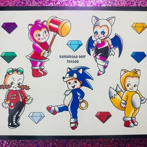 May include: A set of seven colourful cartoon character illustrations, including Sonic the Hedgehog, Tails, and Amy Rose. The characters are drawn in a traditional tattoo style with bold outlines and bright colours. The image also includes several blue, red, and green gemstones.