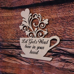 May include: Wooden cutout of a coffee cup with a decorative swirl design and the text "Let God's Word brew in your heart".