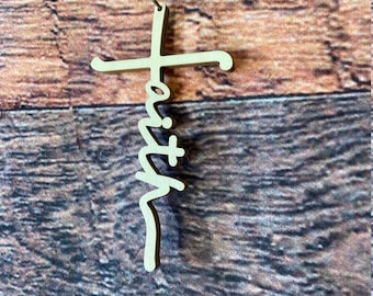 May include: A wooden cross with the word "faith" written in a stylized script.