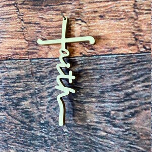 May include: A wooden cross with the word "faith" written in a stylized script.