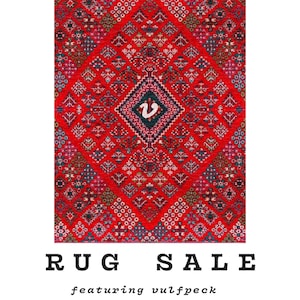 May include: A vibrant red rug with intricate geometric patterns and a central diamond design. The rug features a variety of colors, including blue, green, and white. The text "RUG SALE" is displayed at the bottom, along with additional text.