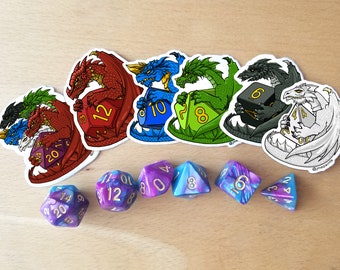 May include: Six colorful dragon stickers with dice in their claws. The dragons are red, blue, green, black, and white. Below the stickers are six multi-colored dice.