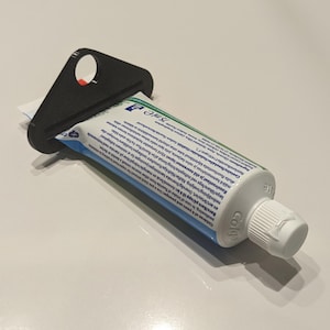 Toothpaste Tube Squeezer Dispenser Presser Squeegee Saver Plastic Holder Tool