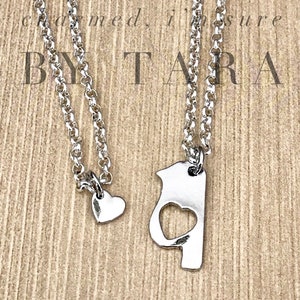 Mother/daughter charm necklace set. You choose bird or moon set.