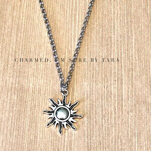 Sun charm necklace