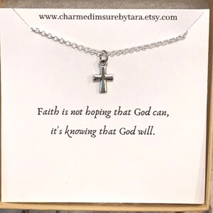 Tiny cross charm necklace on sentiment card.