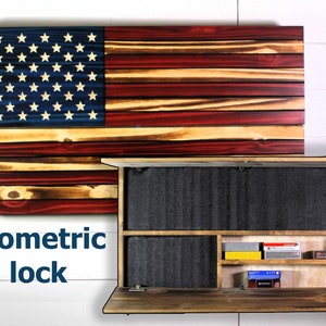 May include: A wooden American flag with a hidden compartment behind it. The compartment is open and reveals a shelf with several small boxes. The text "biometric lock" is visible below the flag.