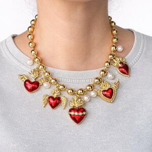 Red Sacred Hearts Statement Necklace • Gold Blessing Hearts • Milagro Amulet Necklace • Baroque Style Pearl & Gold Charm Necklace • Bold