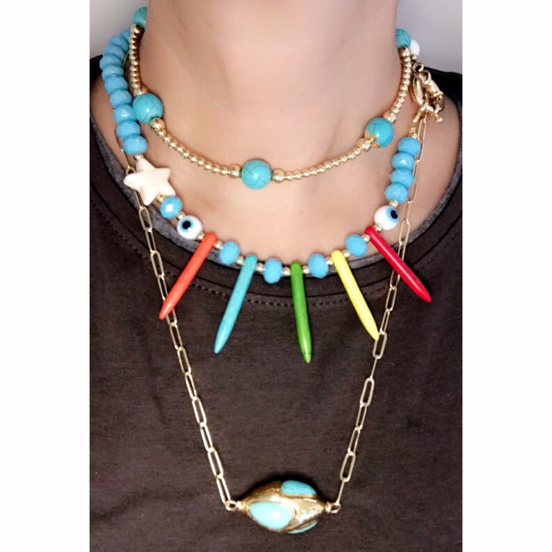 Necklaces of different sizes layers totally handcrafted with semi-precious stones Murano eyes unique totally exclusive gold plated chains