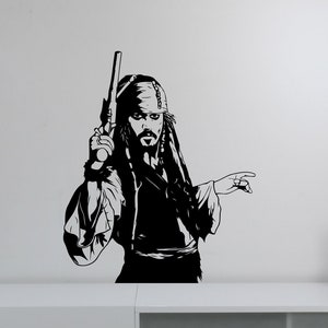 May include: Black and white silhouette of a pirate holding a pistol and pointing with his other hand. He is wearing a bandana and has long hair and a beard.