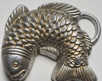 Old aluminum fish cooking mold