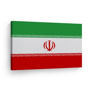 May include: The flag of Iran, a green, white, and red rectangular flag with a red emblem in the center. The emblem is a stylized representation of a lion and sun, surrounded by a wreath of flowers.