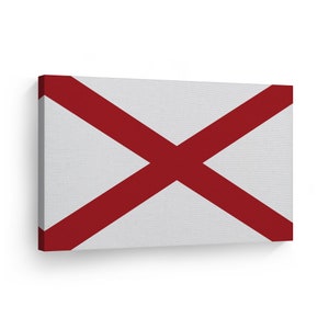 May include: A white canvas print with a red cross design. The cross is centered on the canvas and extends to the edges of the print.