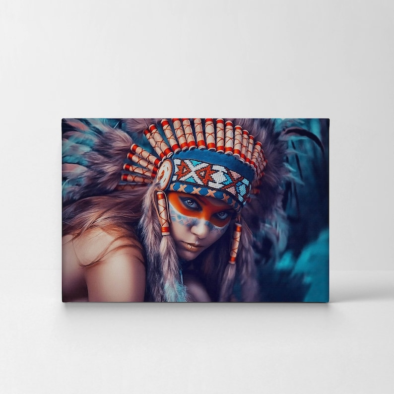 May include: A woman wearing a colorful headdress with feathers and a beaded headband. Her face is painted with blue and white designs. The background is a blurred blue and green.