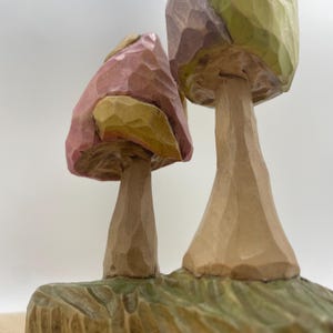 psychedelic mushroom wood carving