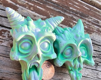 2 Glow in the dark pins from Wicked Wall Masks (lot 6)