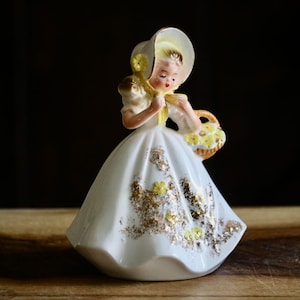 Vintage Giftcraft Girl Figurine with Yellow Flower Basket, Kitschy Cute Spring Decor, Lady in Floral Bonnet w/ Gold Trim, Cottagecore Charm