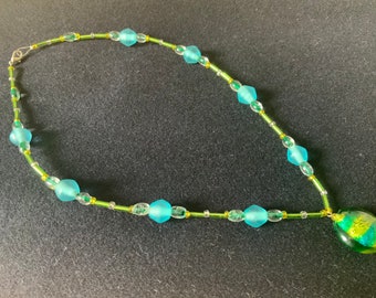 Necklace. Beads. Glass Beads. 18”. Blues and Greens. Really beautiful pendant.