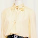 Vintage 70’s LENVOL de FLAMANT PARIS Fine Cream Silk Gathered Blouse w Pleat Front & Back, Full Gathered Cuffed Sleeves and Thin Neck Tie