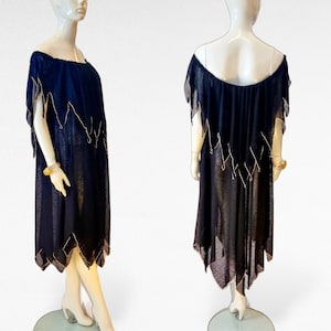Vtg 70s Disco Black Knit Off The Shoulder A-Line Caped Yoke Two Tiered Dress w Gold Trimmed Jagged Trianglular Edge Handkerchief Hems