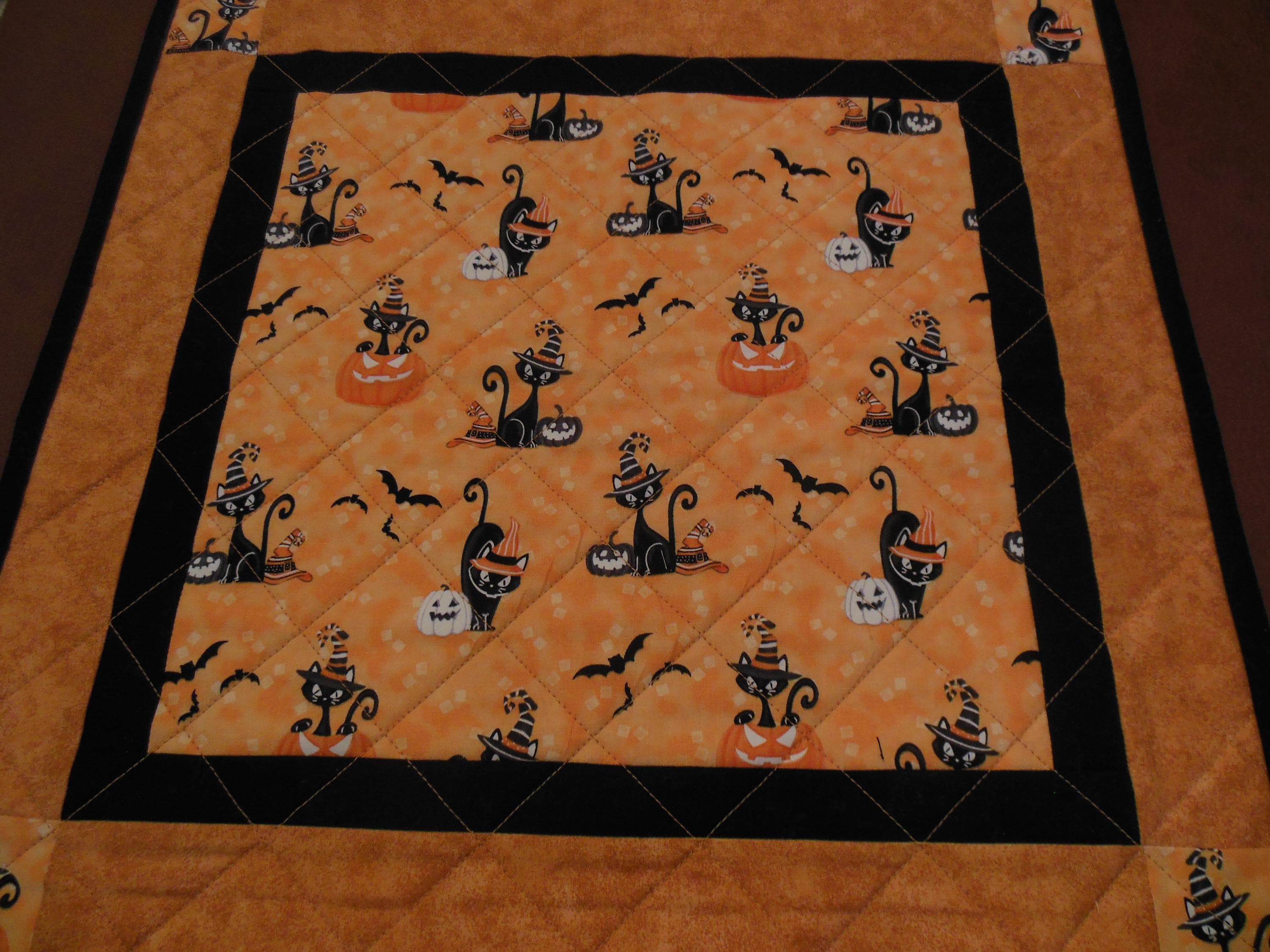 Quilted Halloween table topper.