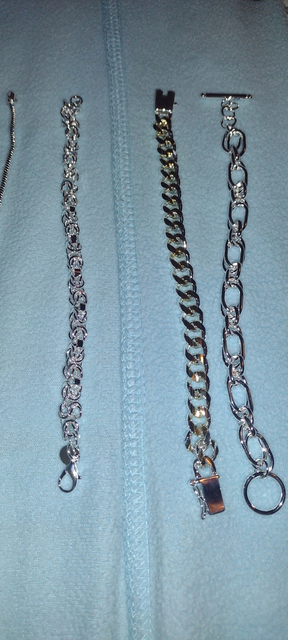 Lot of Four .925 Sterling Silver Bracelets with an