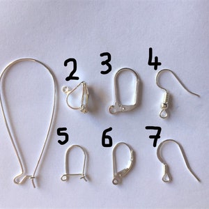 May include: Seven different types of earring findings, including leverback, hook, and French wire. The findings are numbered 1 through 7.