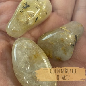 Utah Golden Rutile Quartz Crystals. Tumbled stones. Angels Hair. Balance.com. Helps with energy blockages and negativity. Even depression