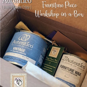 May include: A cardboard box with the text "Paint Your Own Furniture Piece Workshop-in-a-Box" on the top. Inside the box are two cans of paint, one labeled "Autentico Vintage" and the other labeled "Autentico Furniture Wax".