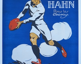 May include: A vintage poster advertising Don du Pétrole HAHIN hair care products. The poster features a rugby player in a white jersey and shorts, running with a red ball. The text reads "Don du Pétrole HAHIN Pour les Cheveux" and "Grand Match de Football Rugby".