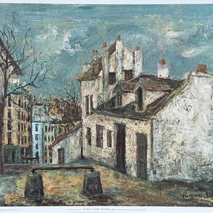 May include: An impressionistic painting of a European cityscape. The artwork depicts buildings with white facades, red-tiled roofs, and chimneys under a cloudy sky. Bare trees and other buildings are visible in the background. The painting is signed in the lower right corner.