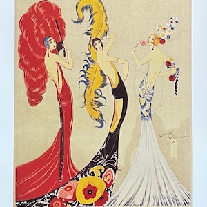 Puede incluir: Un cartel vintage que anuncia una revista musical llamada "La Danse des Libellules" en el teatro Bata-Clan. El cartel presenta a tres mujeres con trajes elaborados y tocados de plumas, con el texto "Jose de Zamosa" en la esquina inferior derecha.