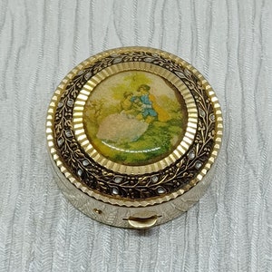 Damascene Pill Box ~ Gold Tone with an Image of a Romantic Couple