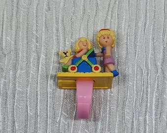 Anneau de poussette Polly Pocket Polly ~ Bluebird Toys 1990 ~ Poussette